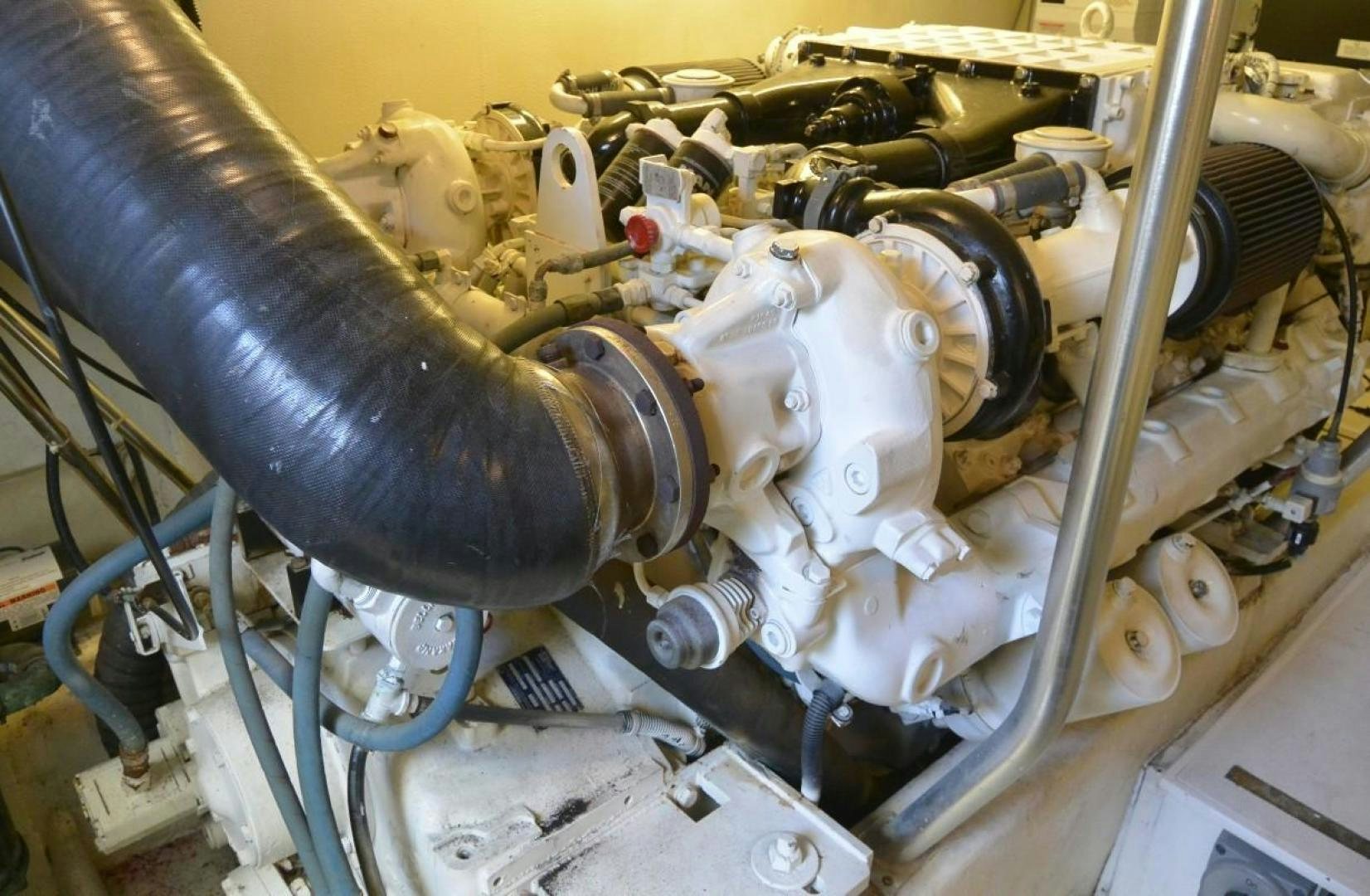 a machine with a large metal pipe aboard DOG HOUSE Yacht for Sale