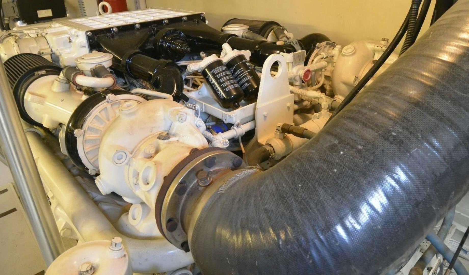 a car engine with a car hood aboard DOG HOUSE Yacht for Sale