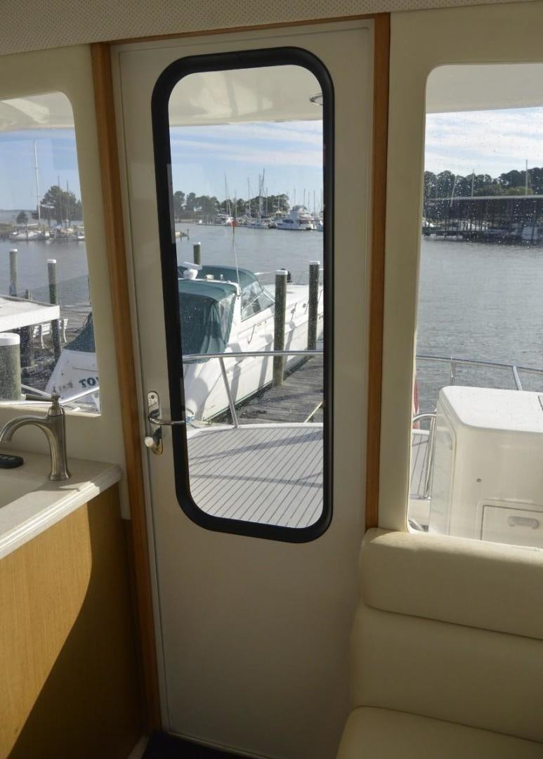 a view of a city from a train window aboard DOG HOUSE Yacht for Sale