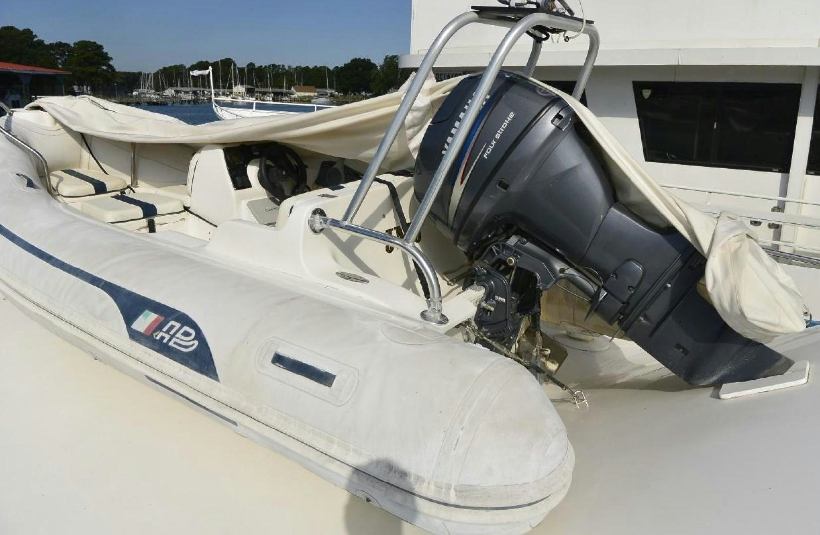 a boat on the water aboard DOG HOUSE Yacht for Sale