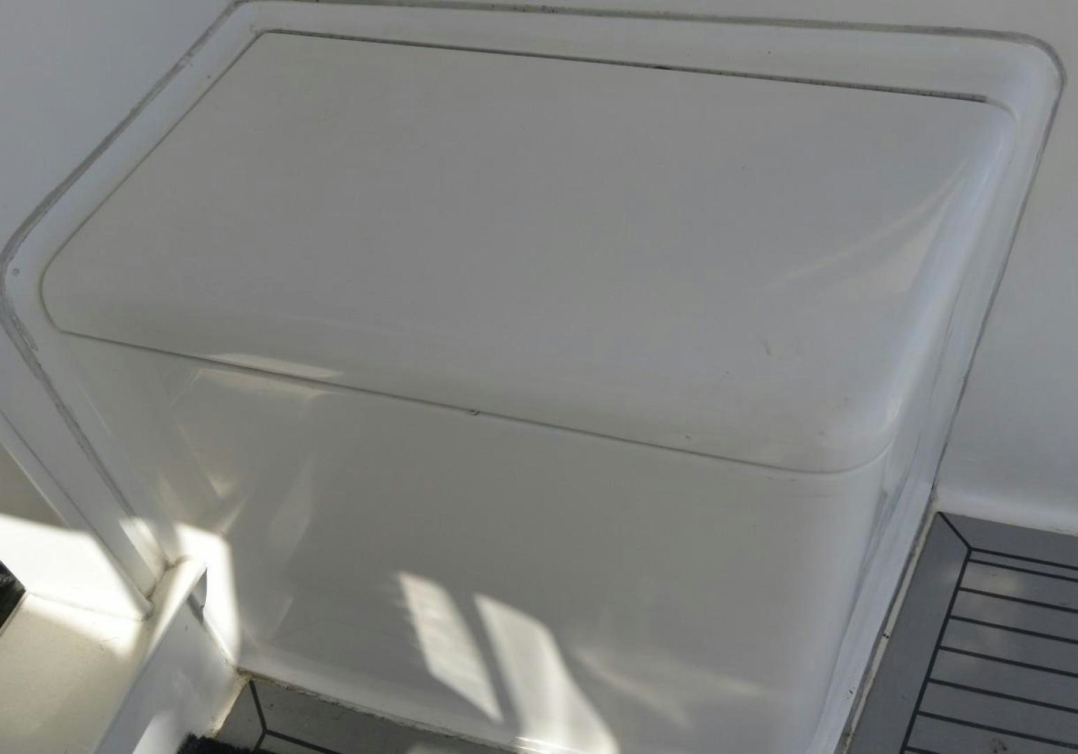 a white object with a hole in it aboard DOG HOUSE Yacht for Sale