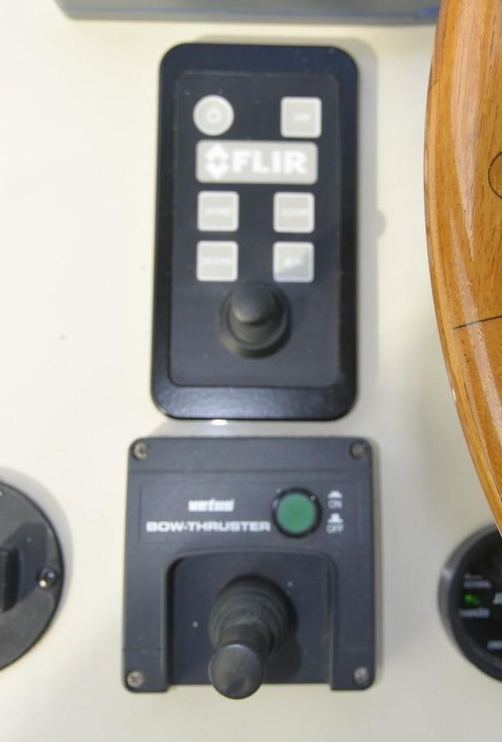 a black rectangular device with a screen aboard DOG HOUSE Yacht for Sale