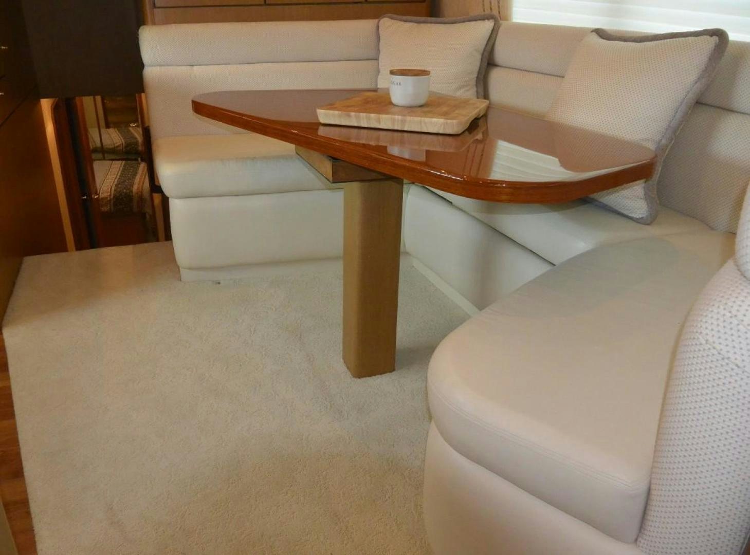 a coffee table with a coffee table aboard DOG HOUSE Yacht for Sale