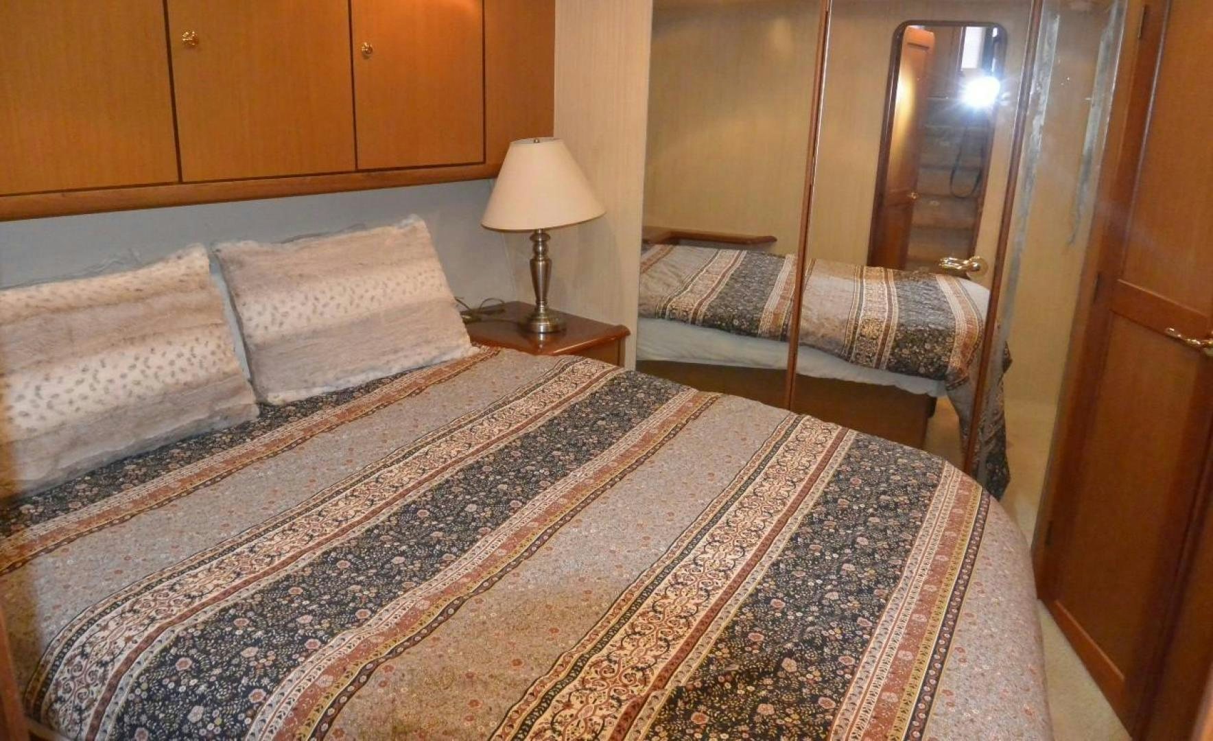 a couple of beds in a hotel room aboard DOG HOUSE Yacht for Sale