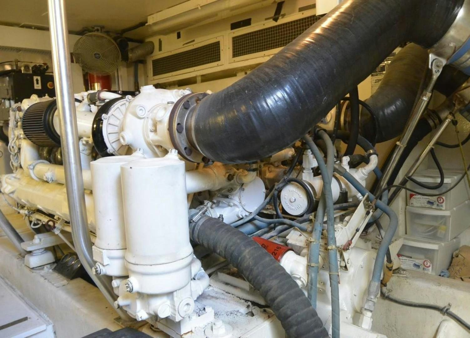 a machine with a large pipe aboard DOG HOUSE Yacht for Sale