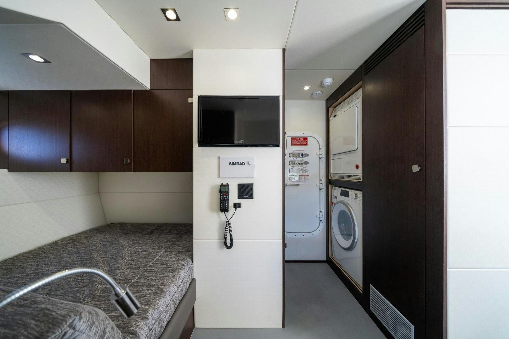 a room with washing machines and a sink aboard Life for Sale Yacht for Sale