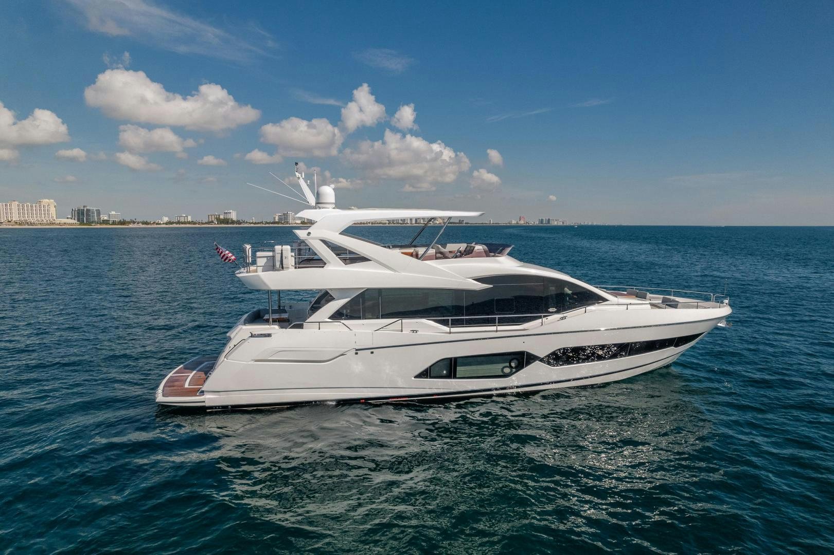 a white yacht on the water aboard Life for Sale Yacht for Sale