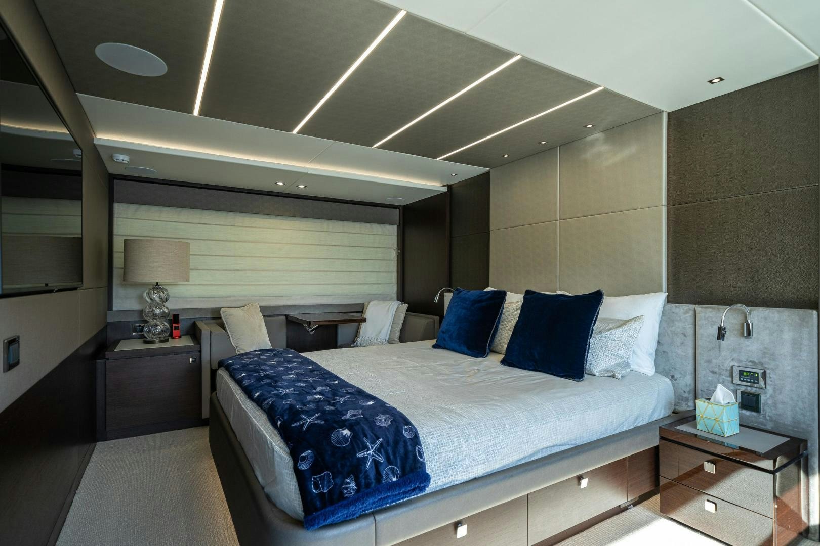 a room with a bed and a table aboard Life for Sale Yacht for Sale