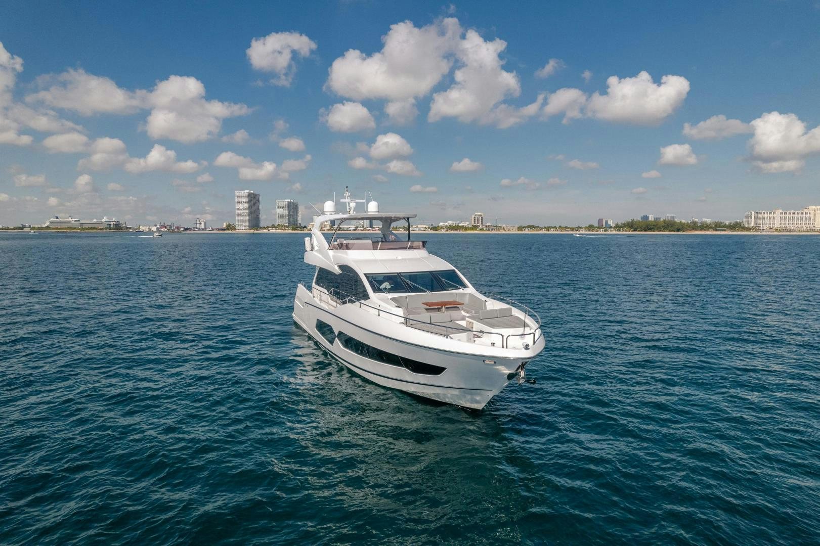 a white boat in the water aboard Life for Sale Yacht for Sale