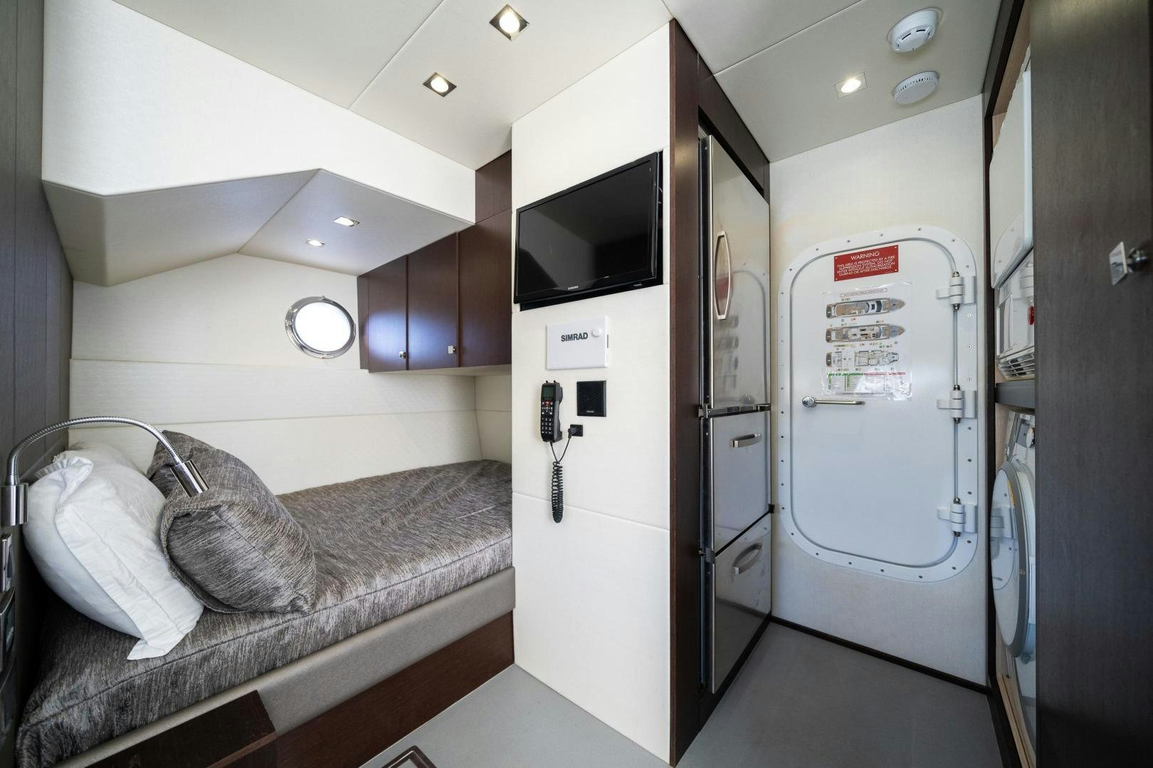 a bathroom with a countertop sink and a large mirror aboard Life for Sale Yacht for Sale