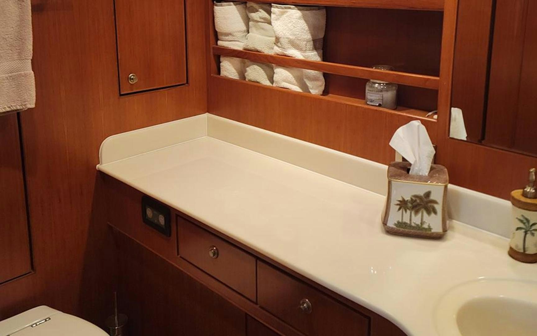 a bathroom with a tub and sink aboard GOWIN PLACES IV Yacht for Sale