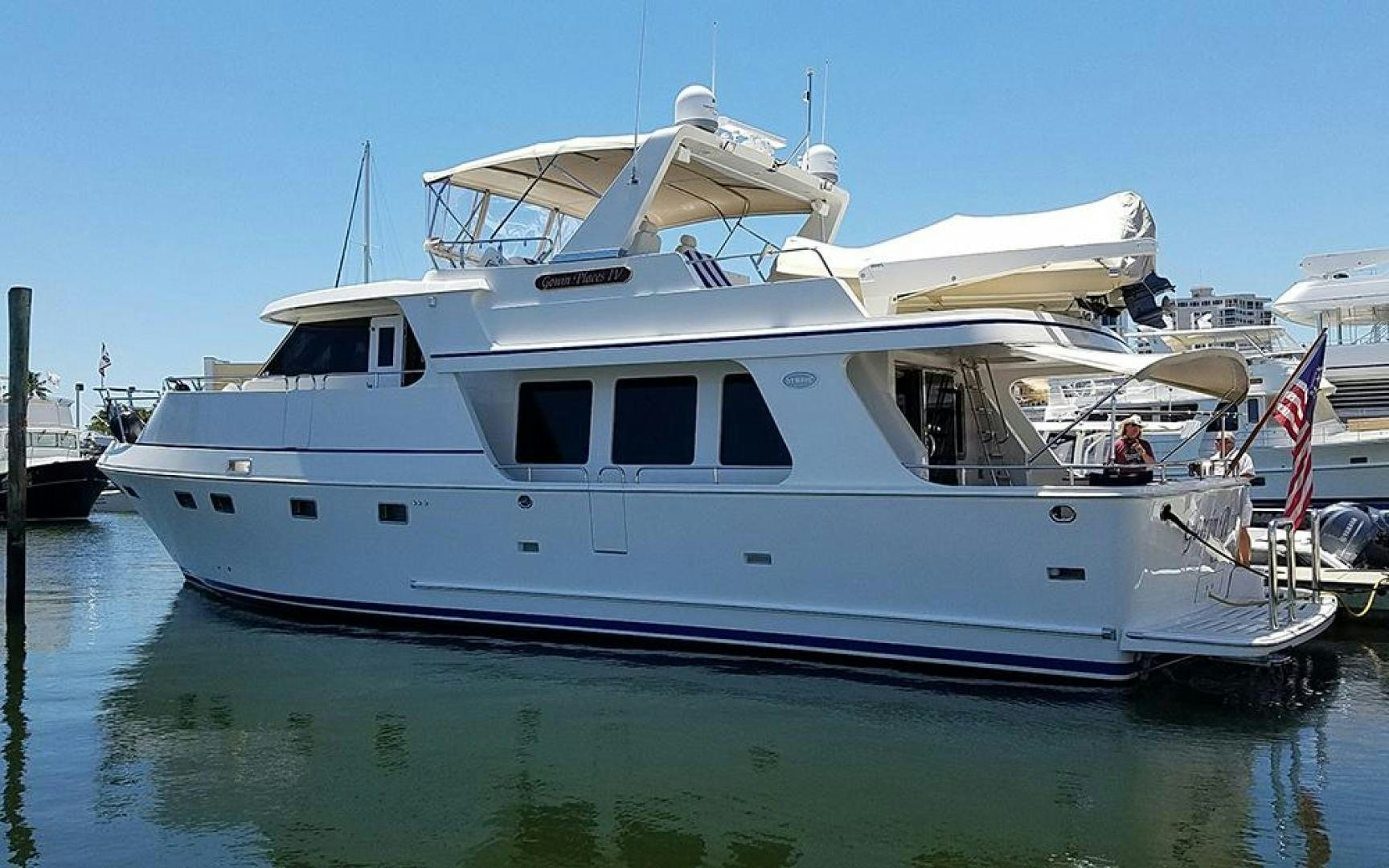 a white yacht docked aboard GOWIN PLACES IV Yacht for Sale