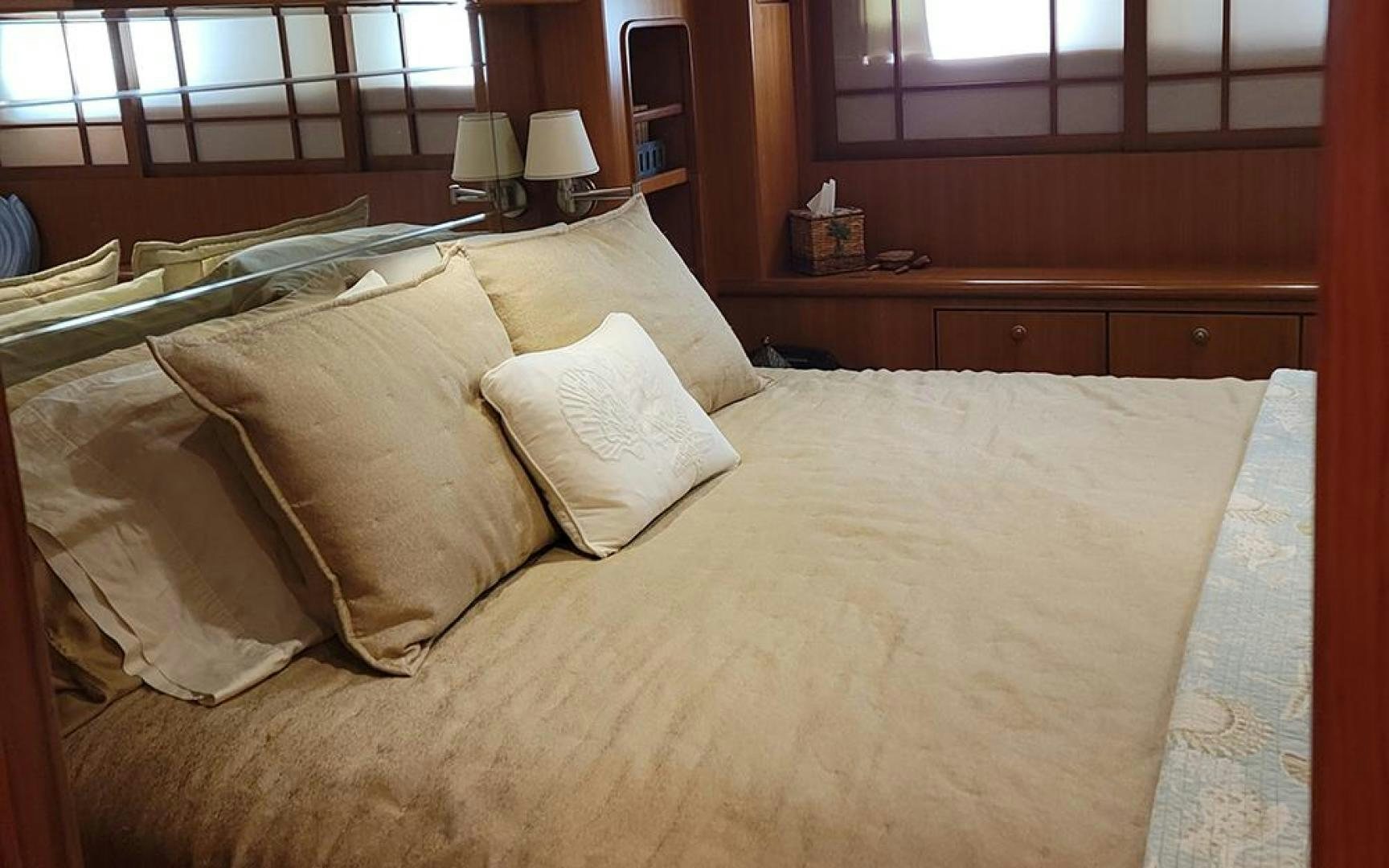 a bed with pillows aboard GOWIN PLACES IV Yacht for Sale