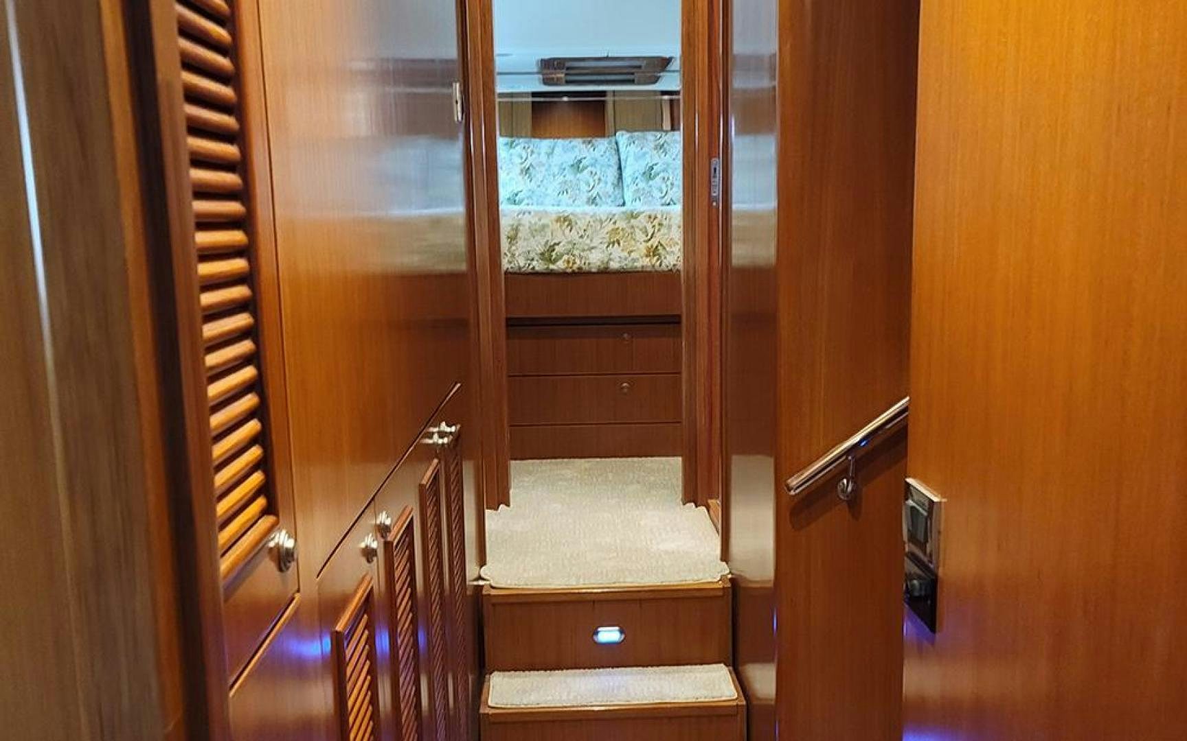 a closet with a door open aboard GOWIN PLACES IV Yacht for Sale
