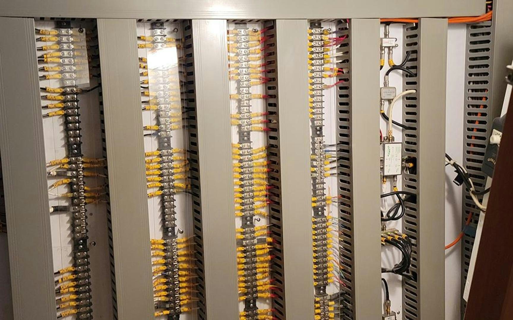 rows of white and yellow striped servers aboard GOWIN PLACES IV Yacht for Sale