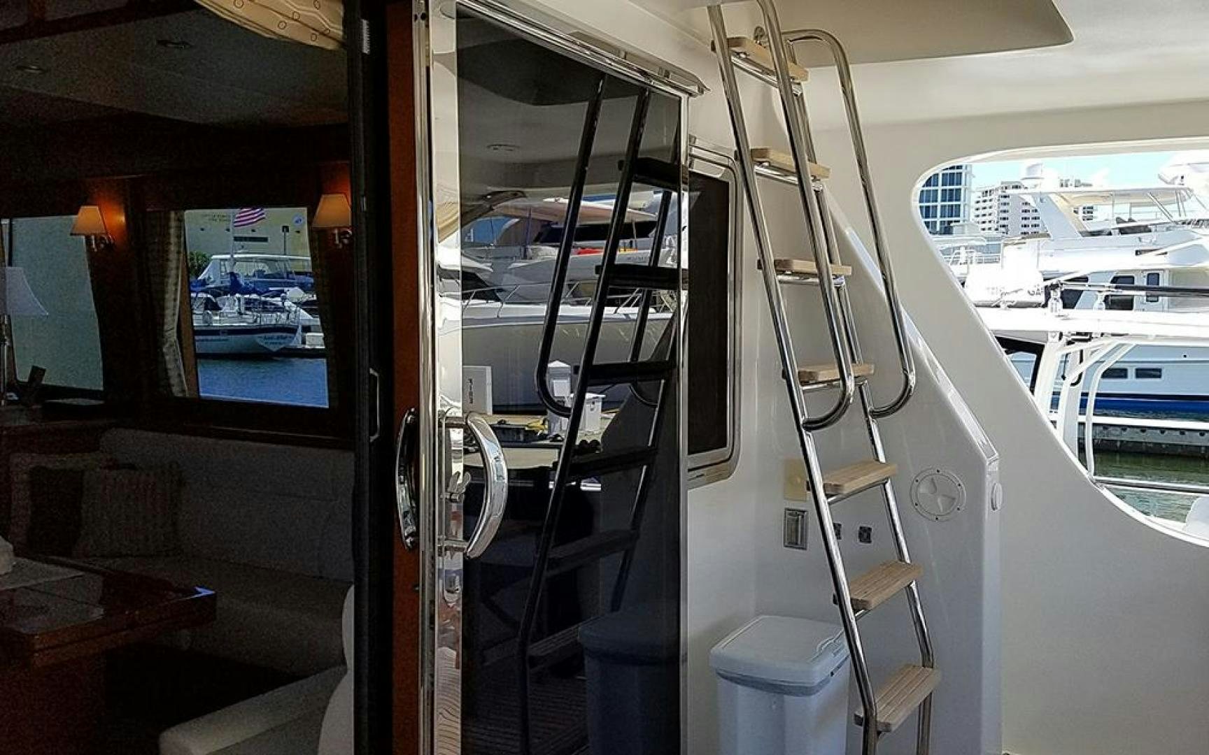 a glass door leading to a train aboard GOWIN PLACES IV Yacht for Sale