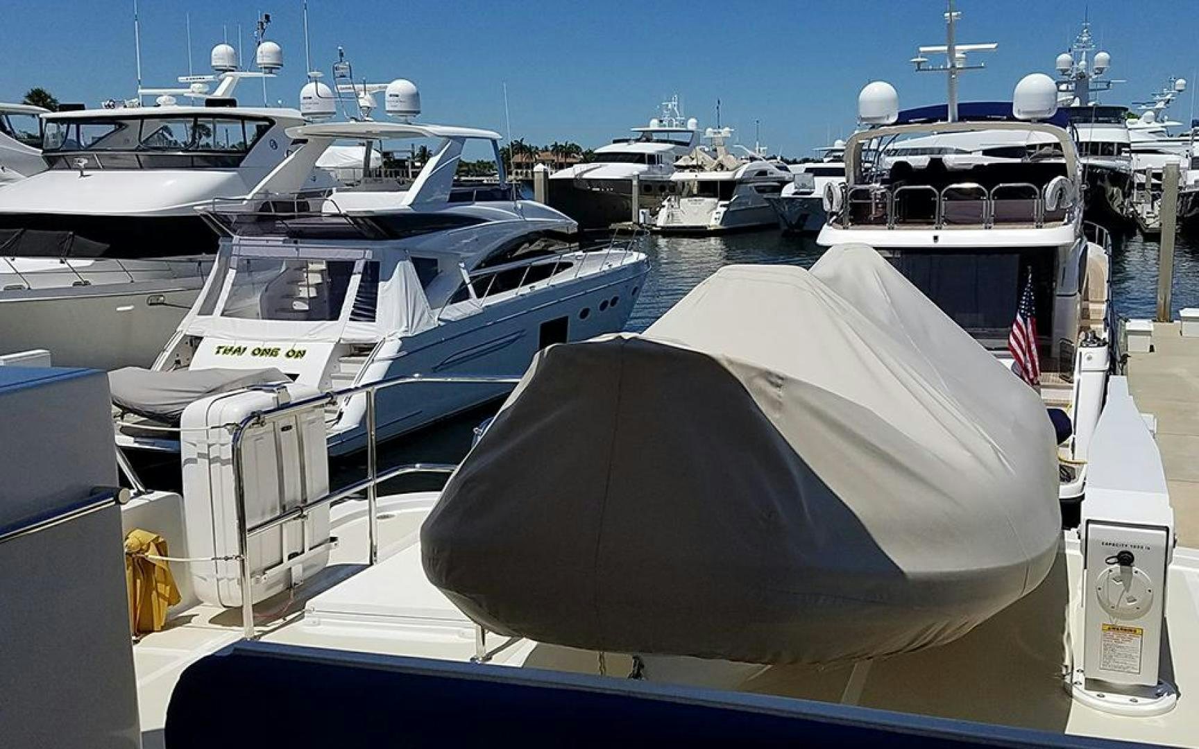 a boat docked at a pier aboard GOWIN PLACES IV Yacht for Sale