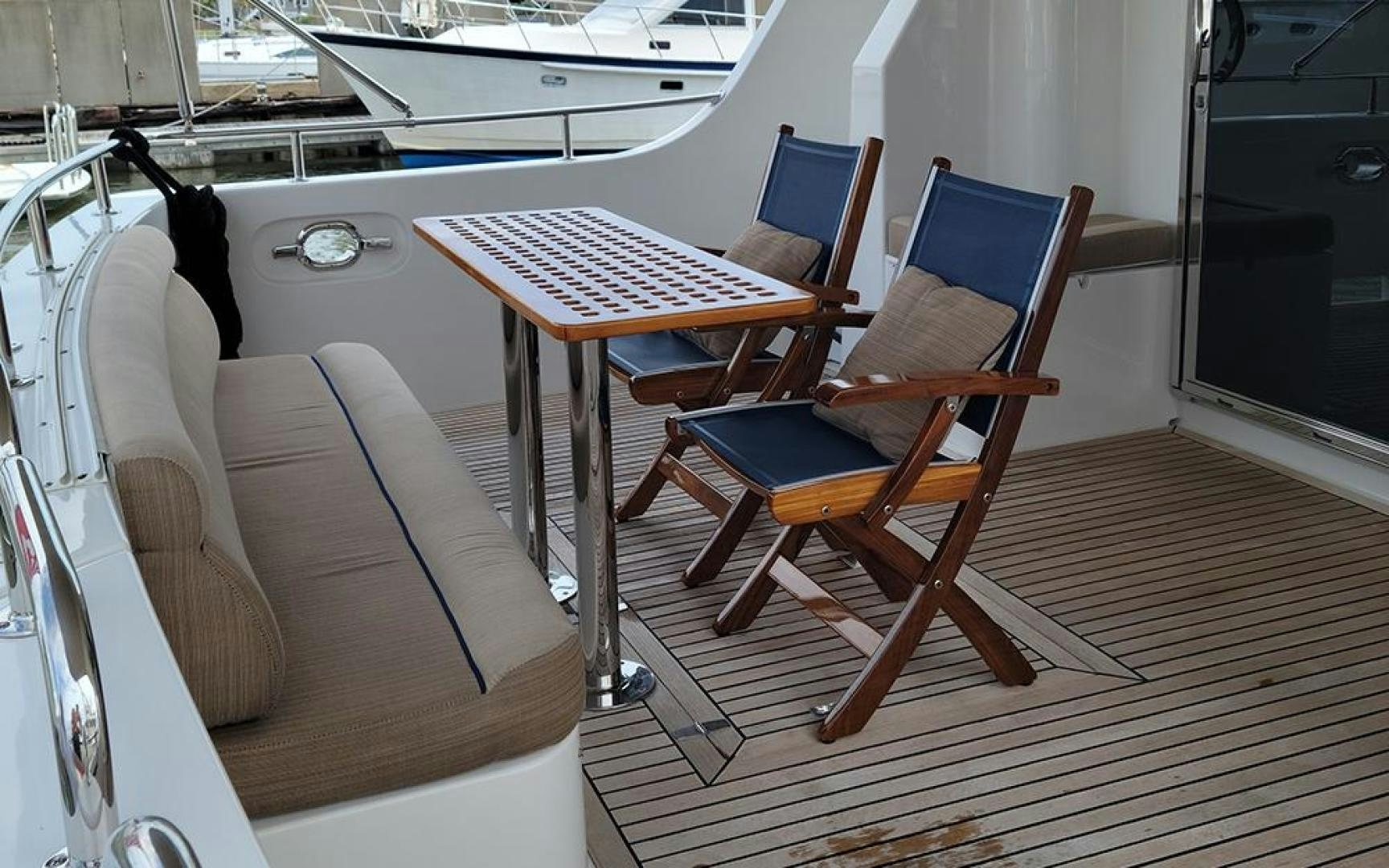a table and chairs in a room aboard GOWIN PLACES IV Yacht for Sale