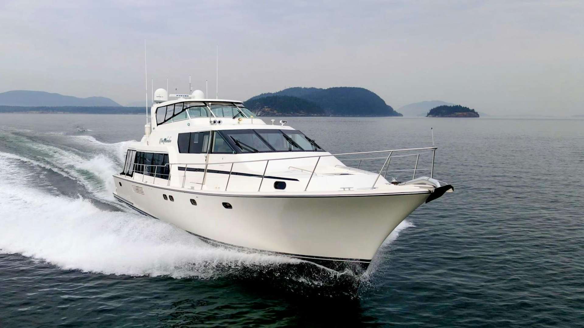 a white yacht on the water aboard new adventure Yacht for Sale