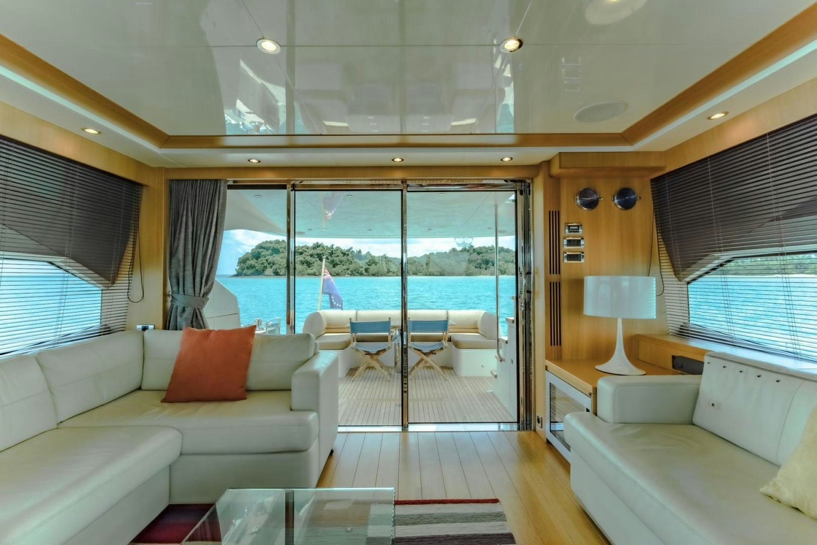 a living room with a large window aboard GIFZY Yacht for Sale