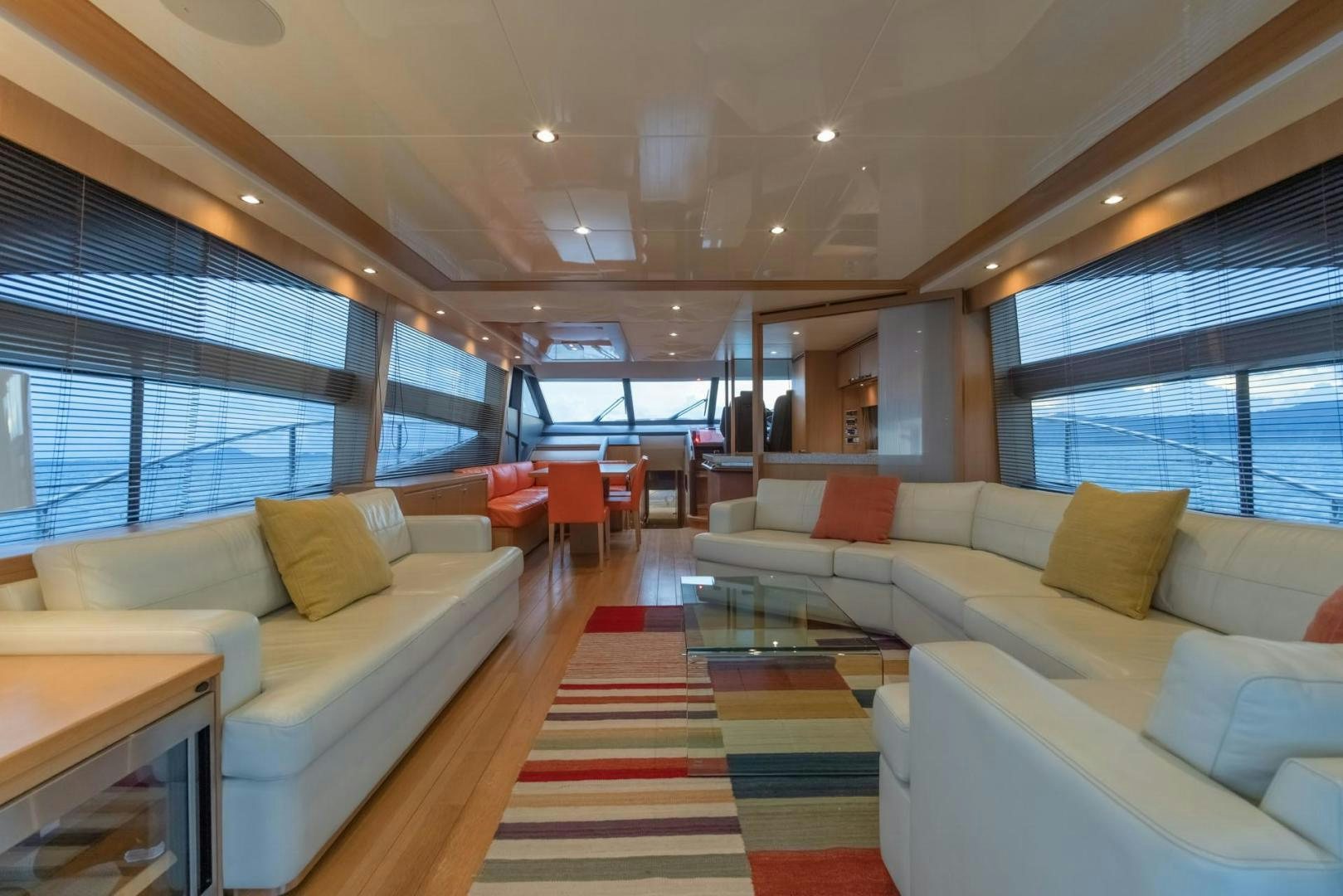 a living room with a large window aboard GIFZY Yacht for Sale