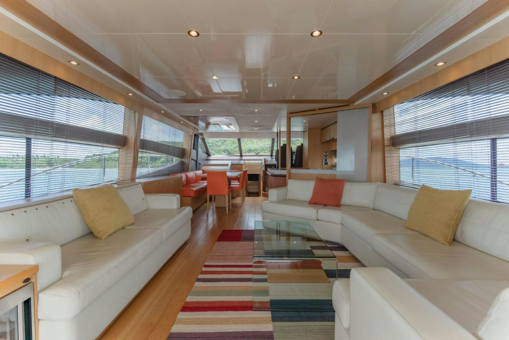 a large living room with a large window aboard GIFZY Yacht for Sale