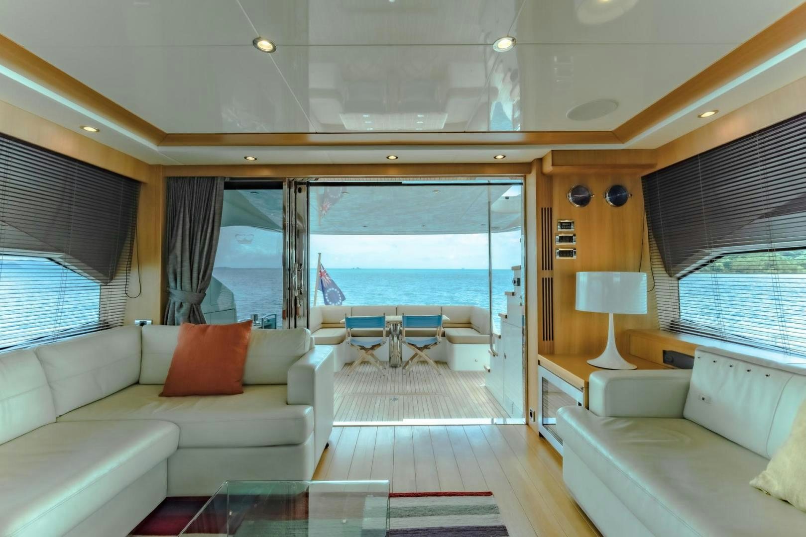 a living room with a large window aboard GIFZY Yacht for Sale