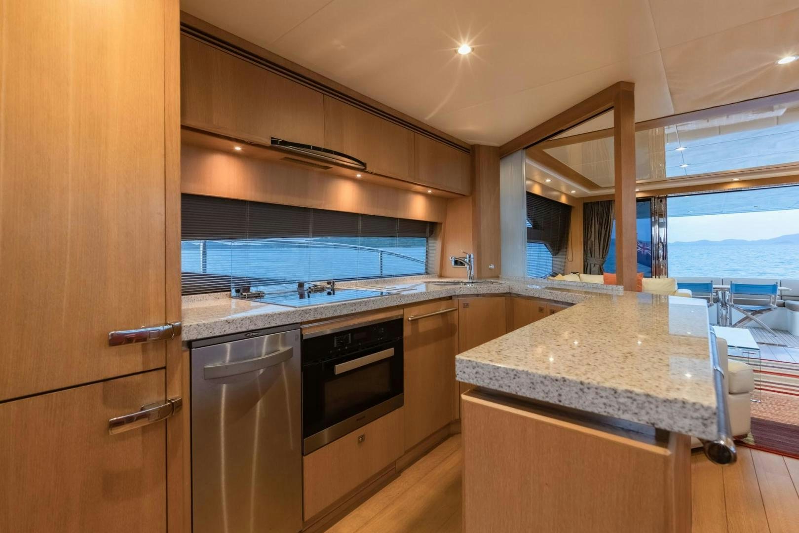 a kitchen with a large window aboard GIFZY Yacht for Sale