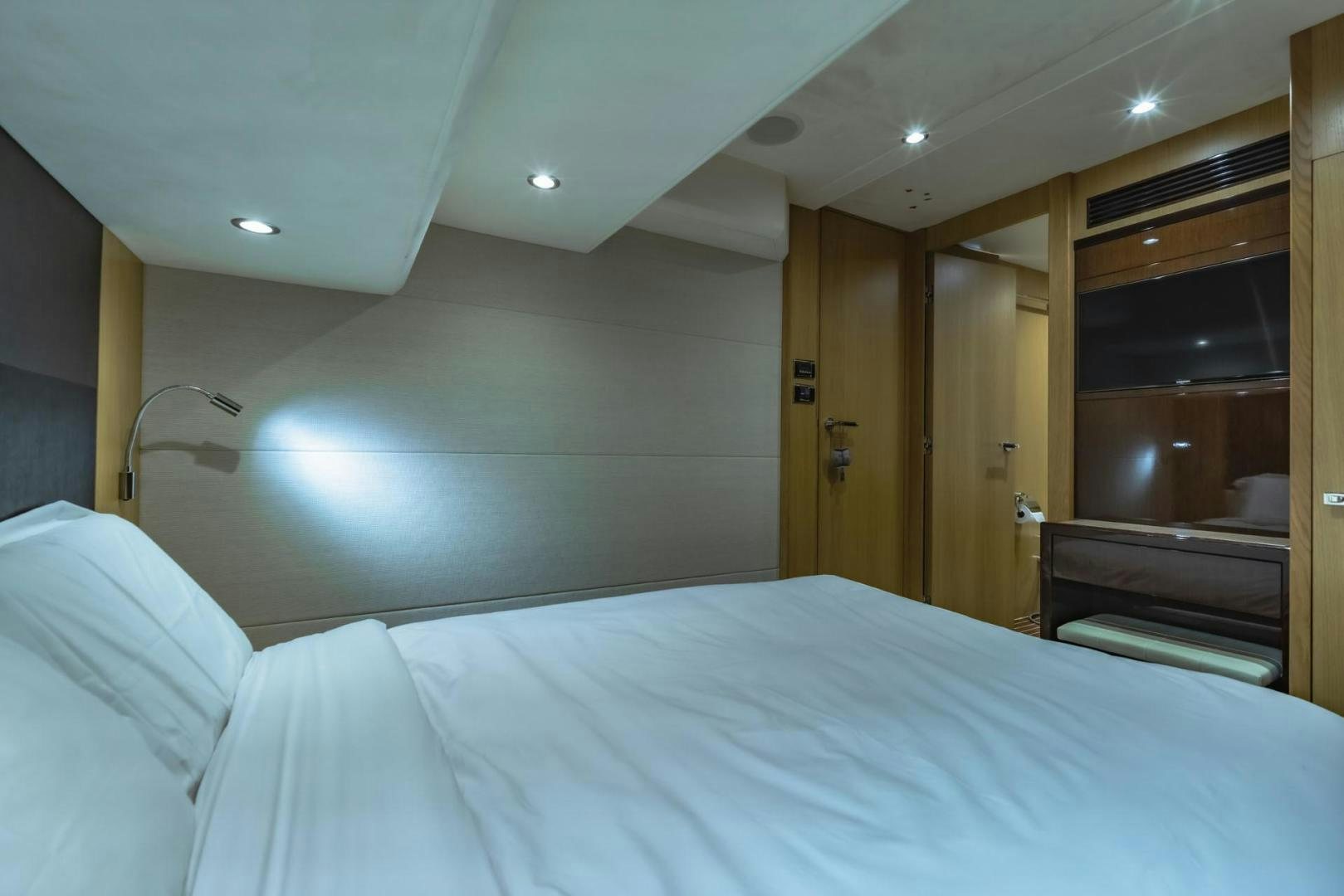 a bed in a room aboard GIFZY Yacht for Sale