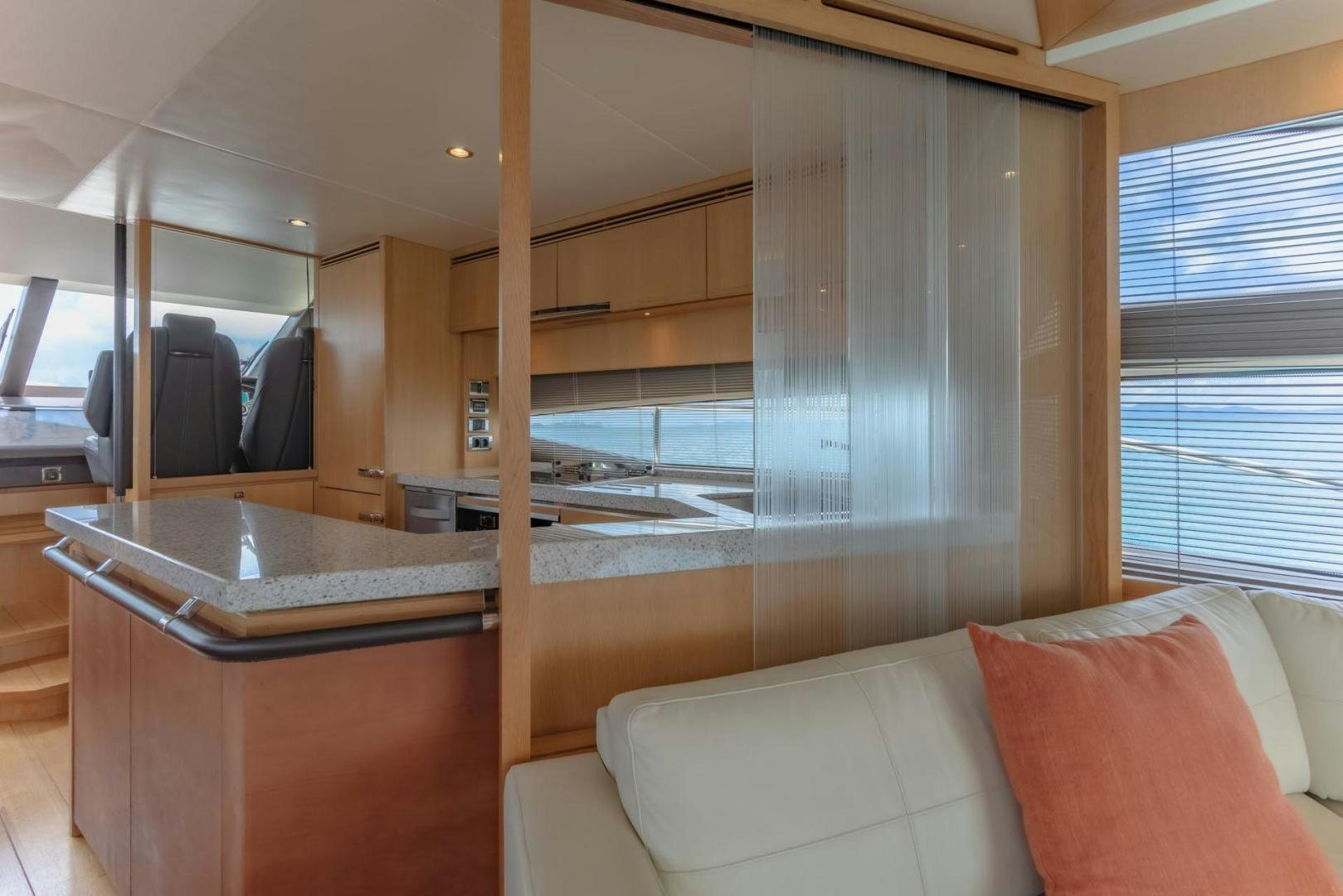 a room with a couch and a table aboard GIFZY Yacht for Sale