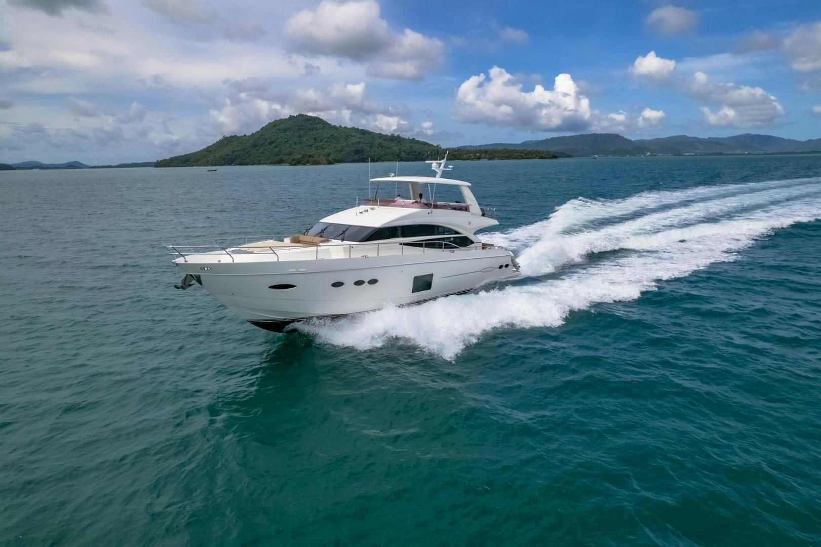 a white yacht on the water aboard GIFZY Yacht for Sale