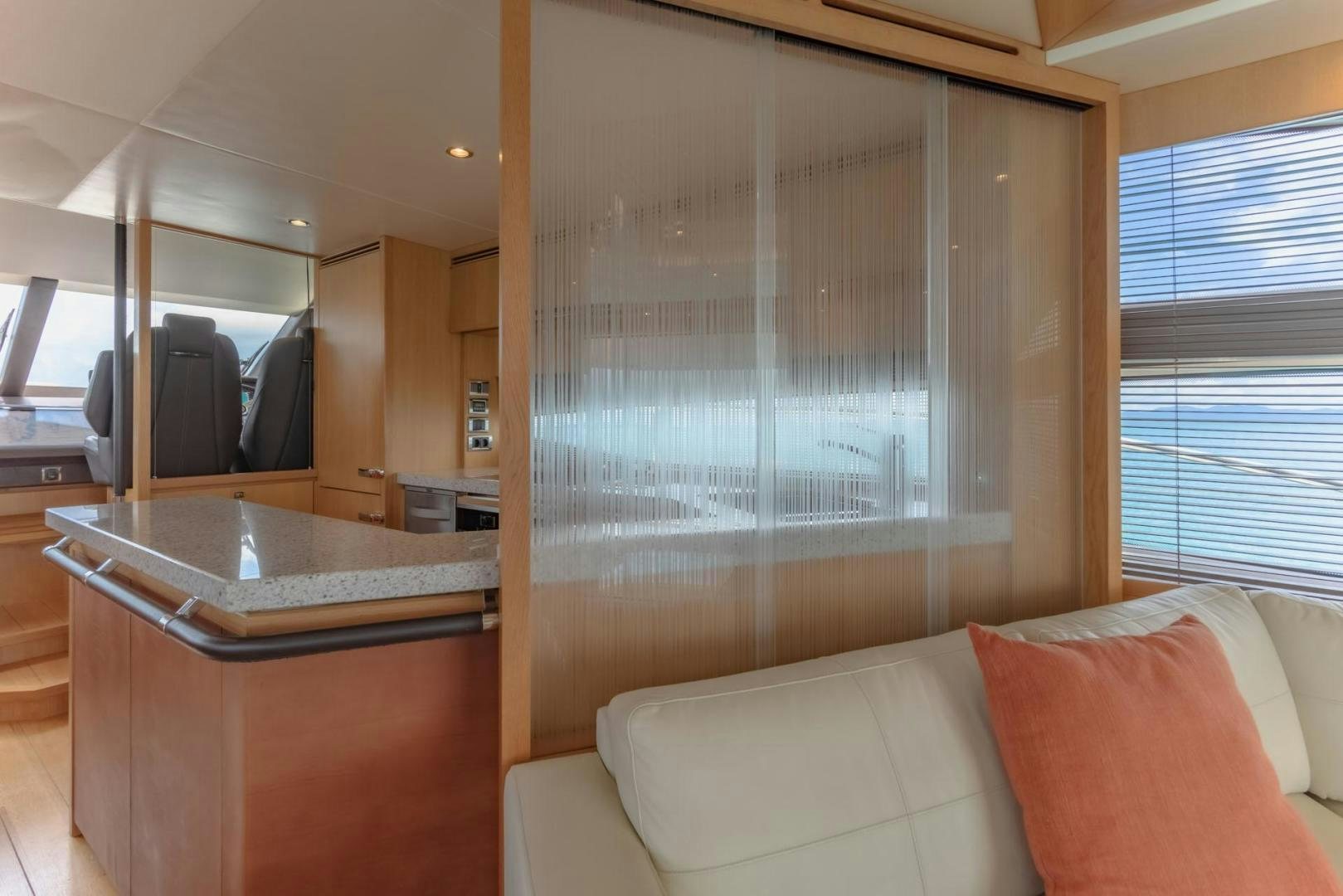 a room with a couch and a table aboard GIFZY Yacht for Sale