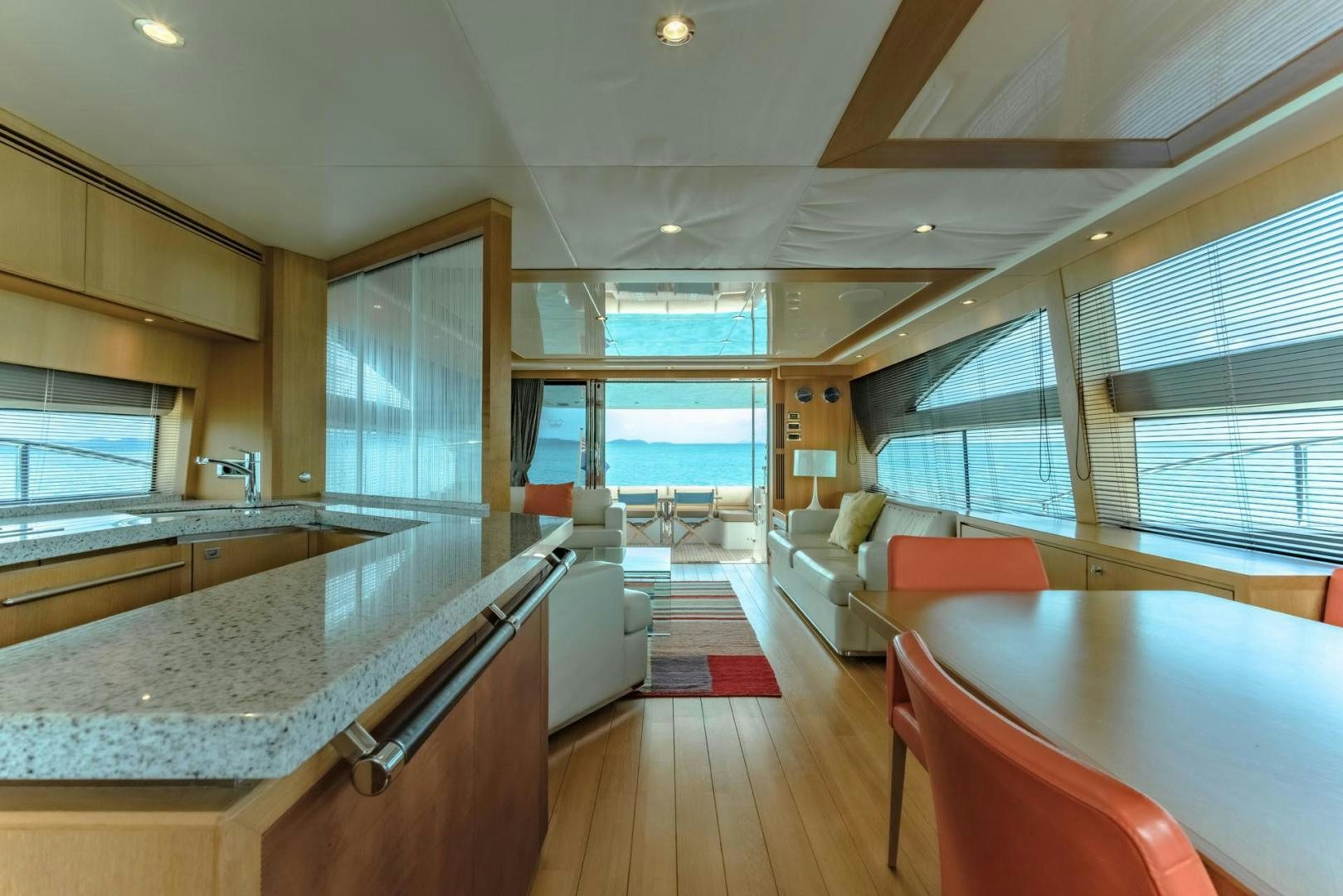 a large kitchen with a large island aboard GIFZY Yacht for Sale