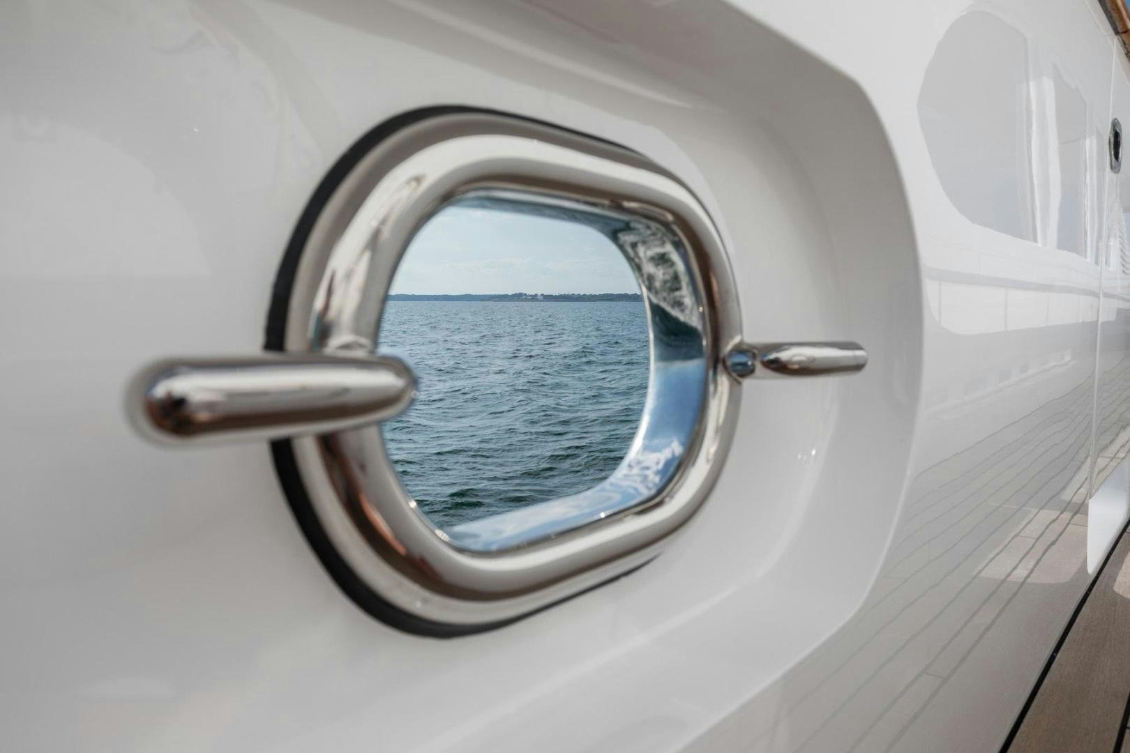 a view of the sky through an airplane window aboard PURA VIDA Yacht for Sale