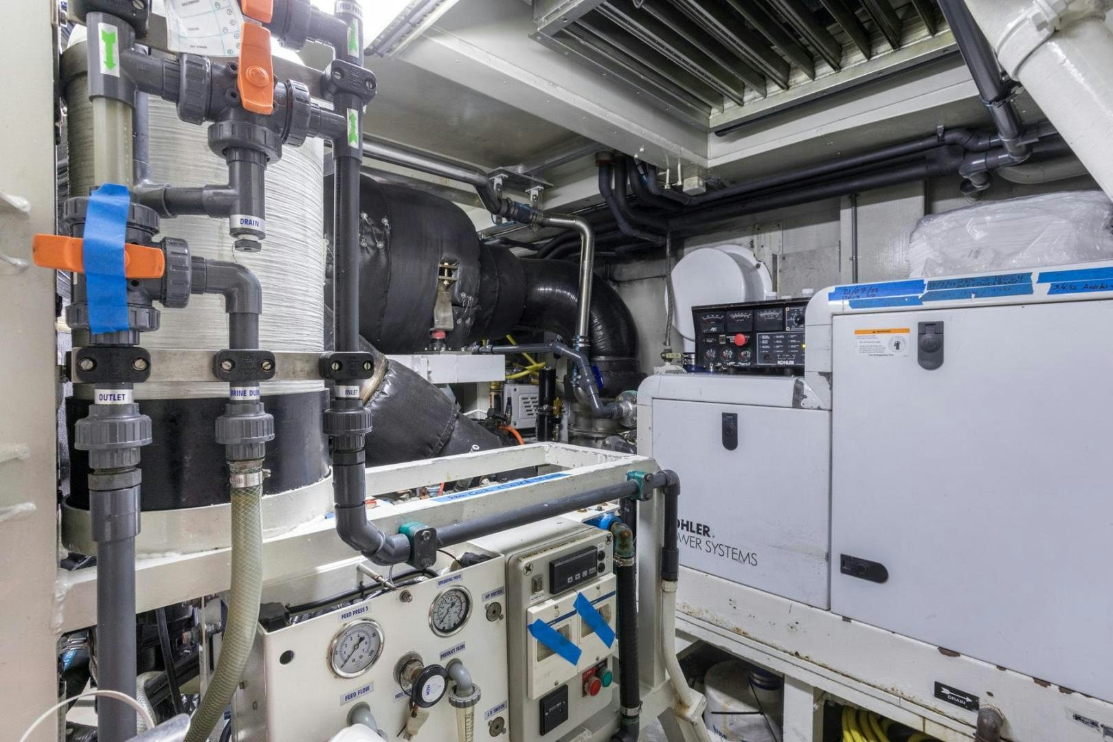 a machine with a large piece of equipment in it aboard PURA VIDA Yacht for Sale