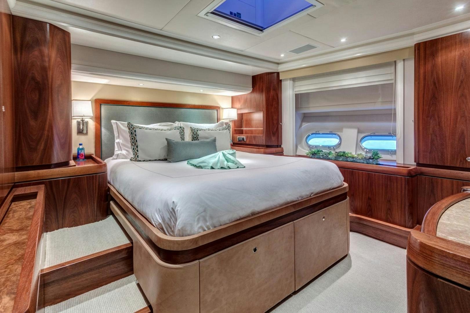 a bed in a room aboard PURA VIDA Yacht for Sale