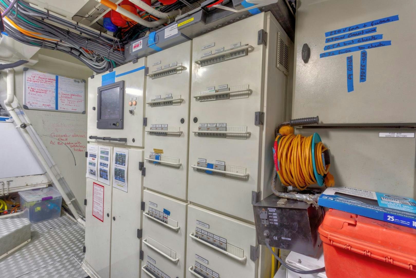 a room with shelves and equipment aboard PURA VIDA Yacht for Sale