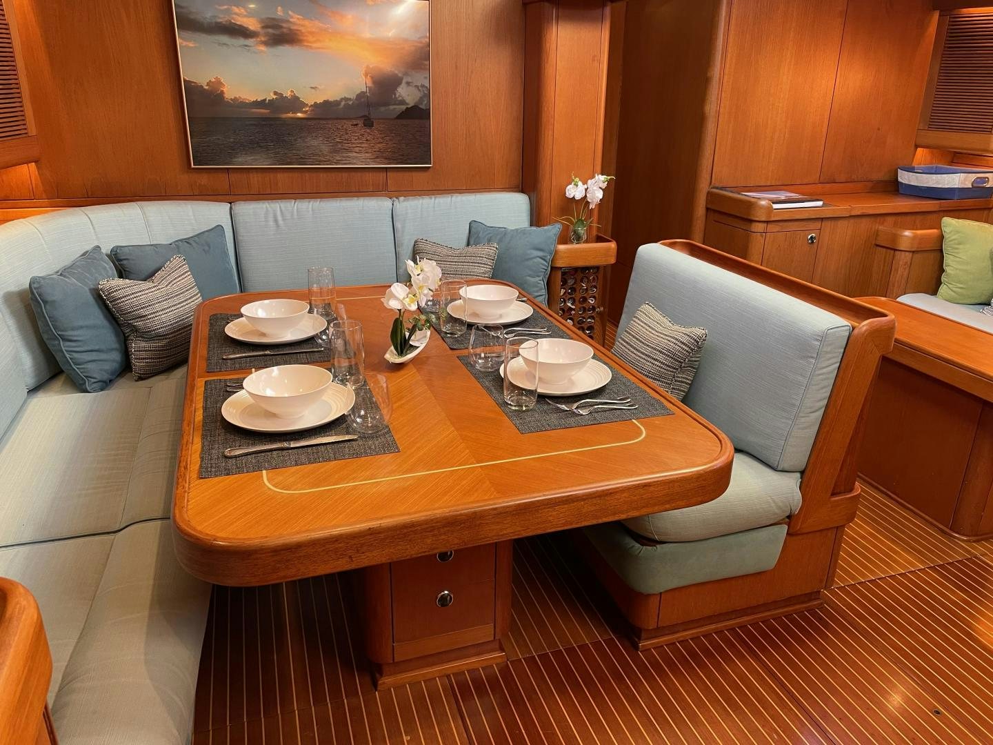 a table with plates and cups on it aboard DISCO LEMONADE Yacht for Sale