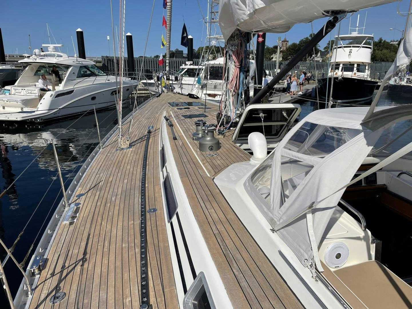 a boat with a large deck aboard DISCO LEMONADE Yacht for Sale
