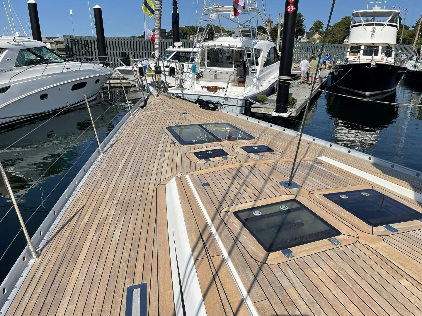 a deck with boats and people aboard DISCO LEMONADE Yacht for Sale