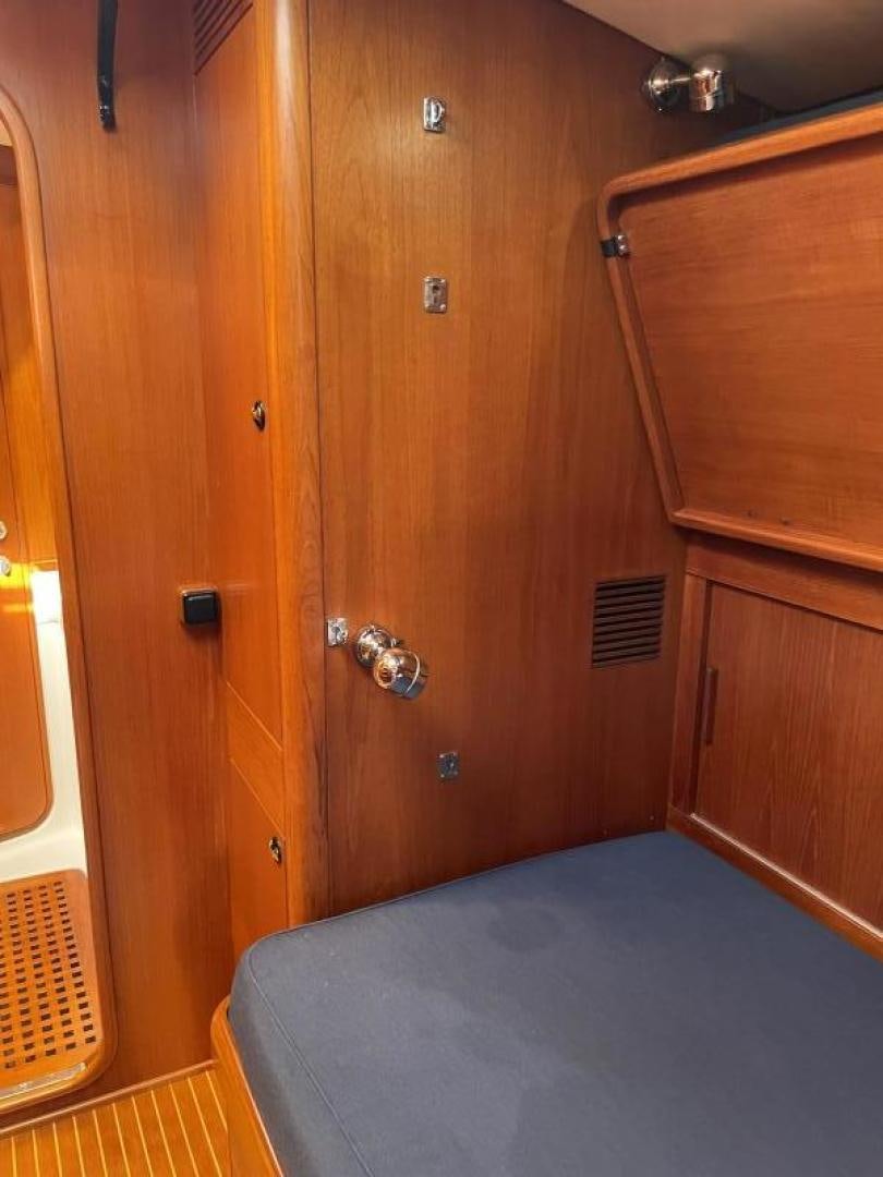 a bed in a room aboard DISCO LEMONADE Yacht for Sale