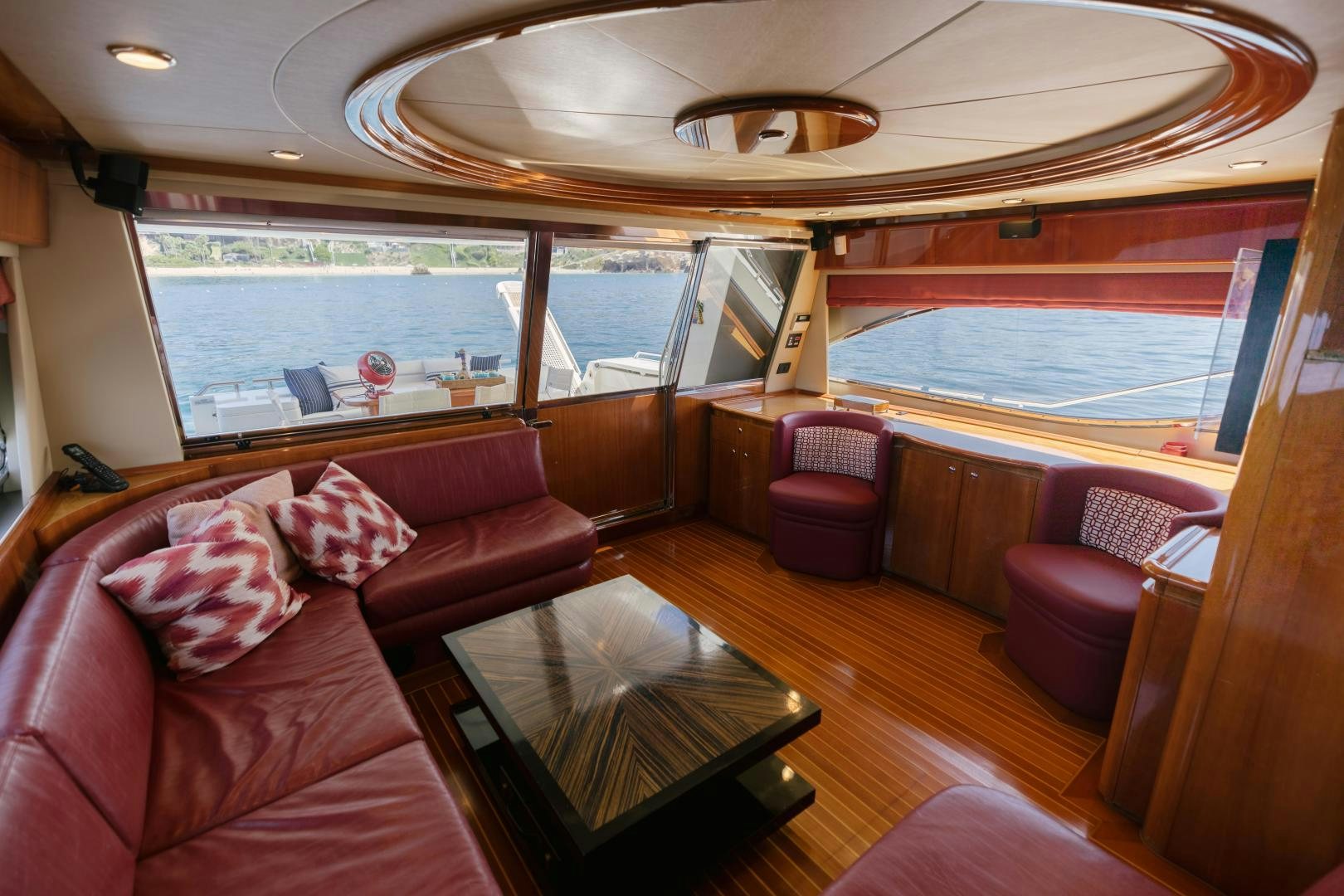 a train with a table and chairs aboard LIVING LIFE Yacht for Sale