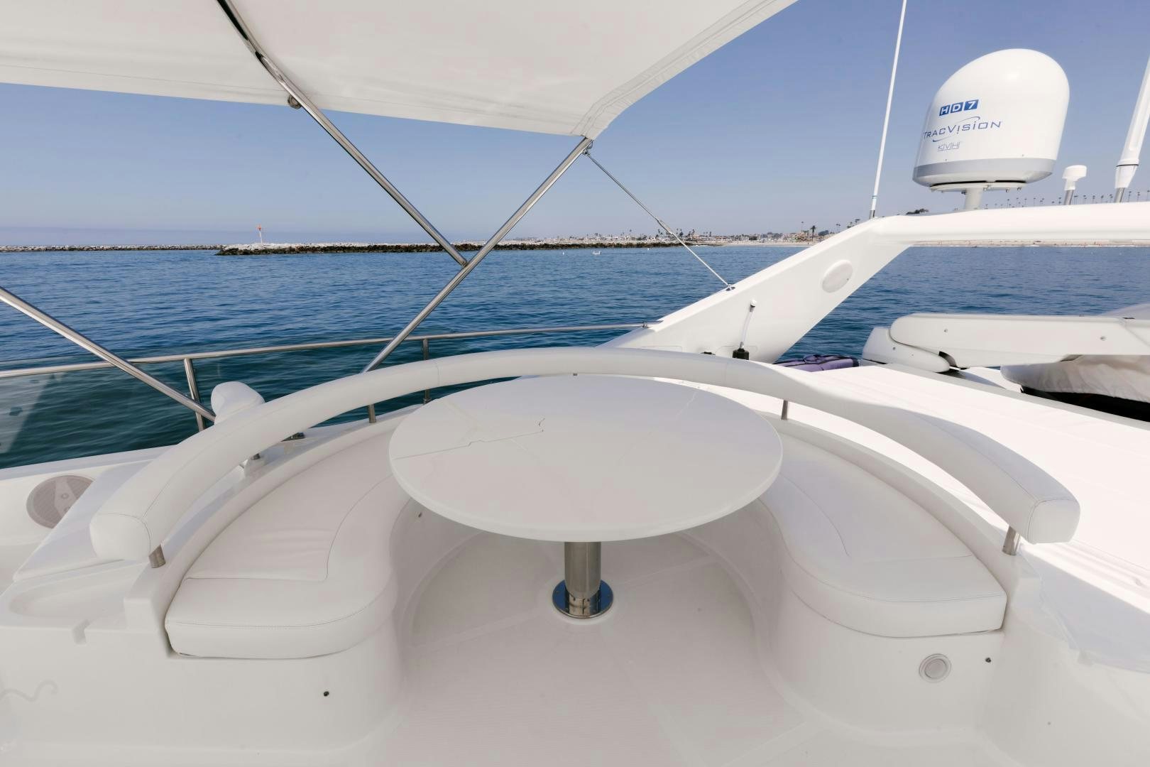 a white boat on the water aboard LIVING LIFE Yacht for Sale