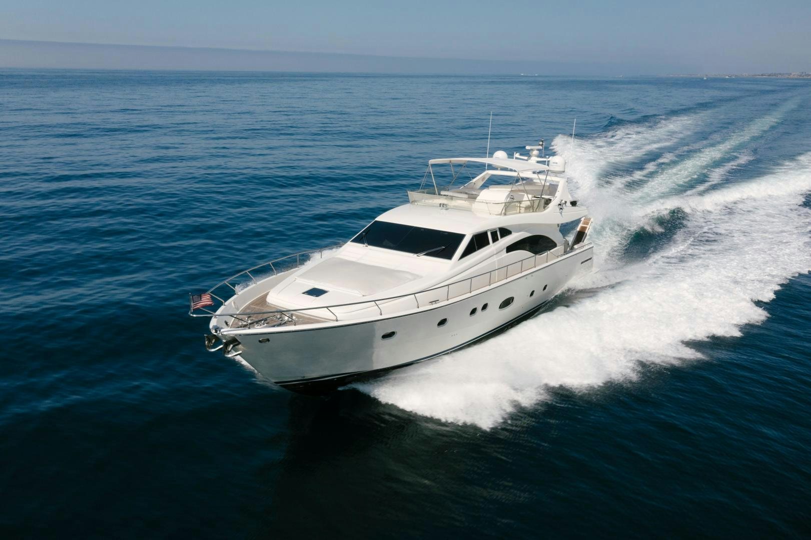 a white yacht on the water aboard LIVING LIFE Yacht for Sale