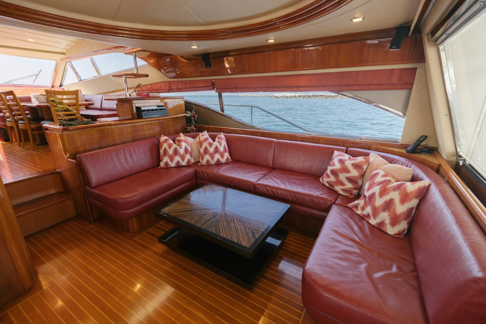a living room with a large swimming pool aboard LIVING LIFE Yacht for Sale