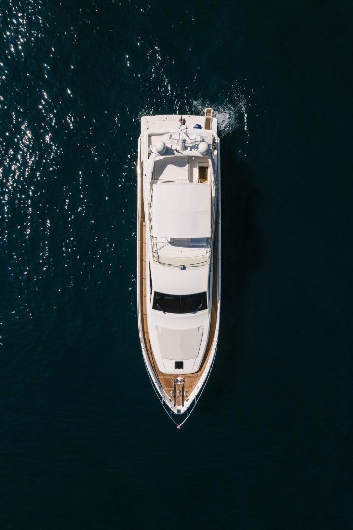 a white boat in the water aboard LIVING LIFE Yacht for Sale