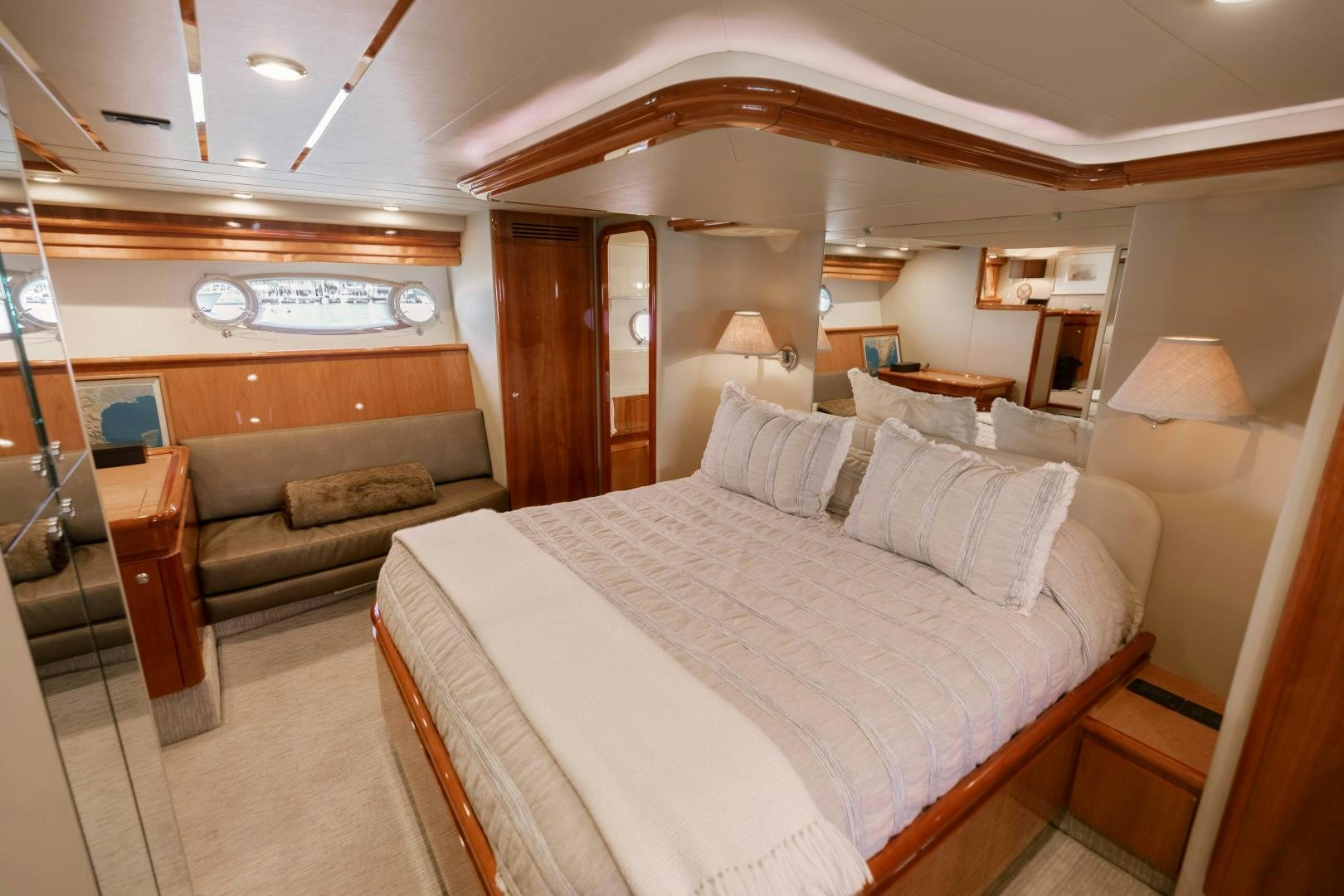 a large bedroom with a bed aboard LIVING LIFE Yacht for Sale
