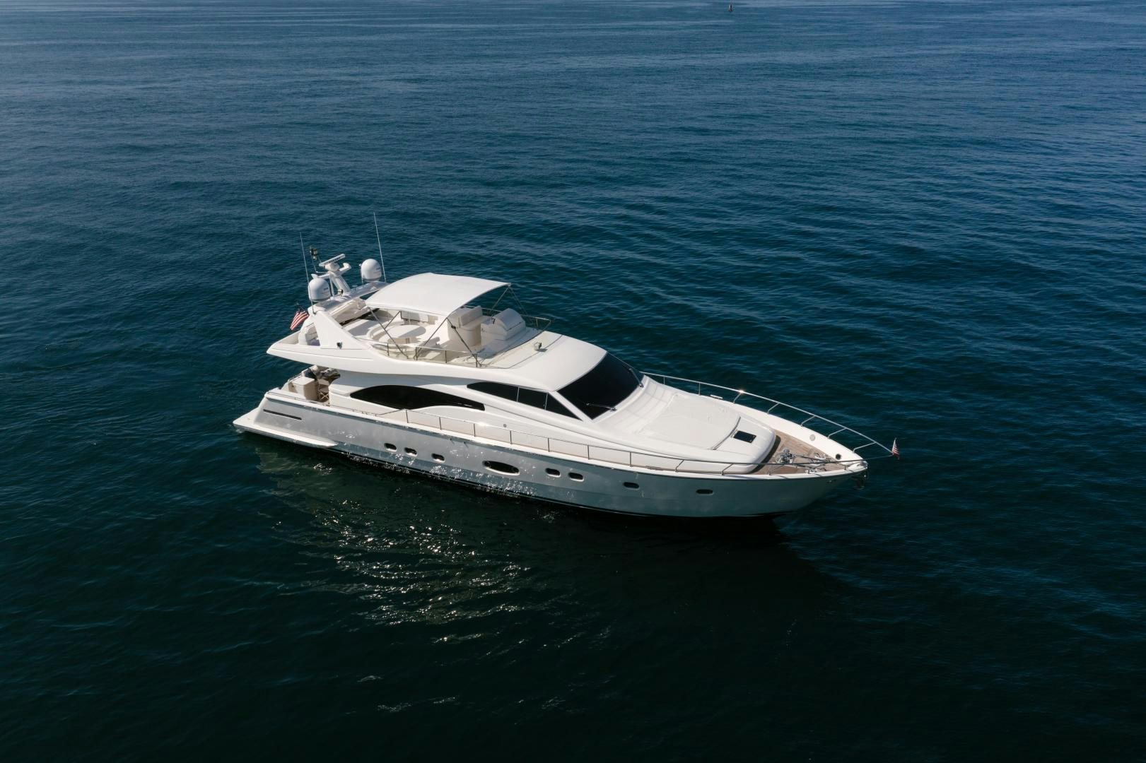 a white boat in the water aboard LIVING LIFE Yacht for Sale