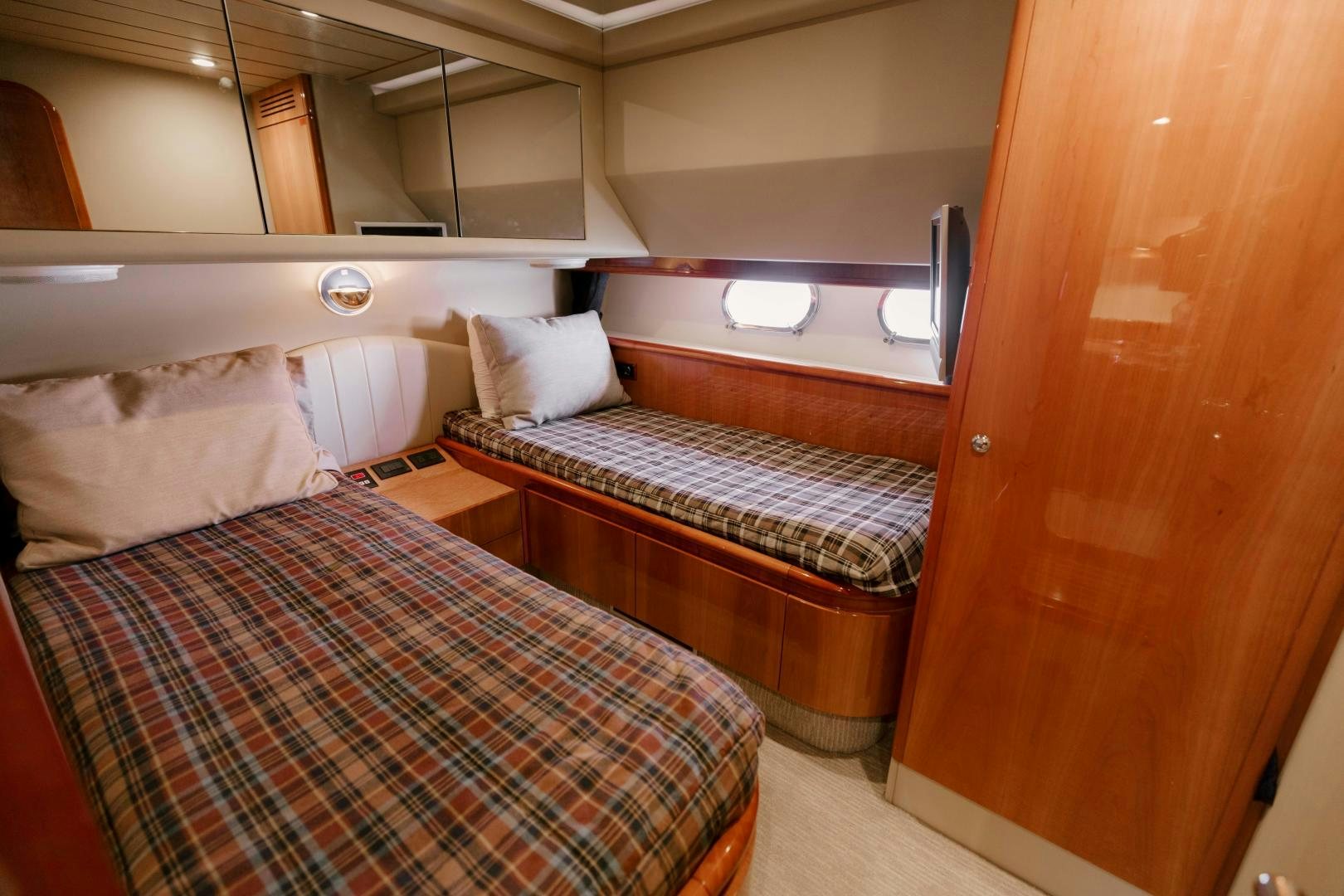 a couple of beds in a room aboard LIVING LIFE Yacht for Sale