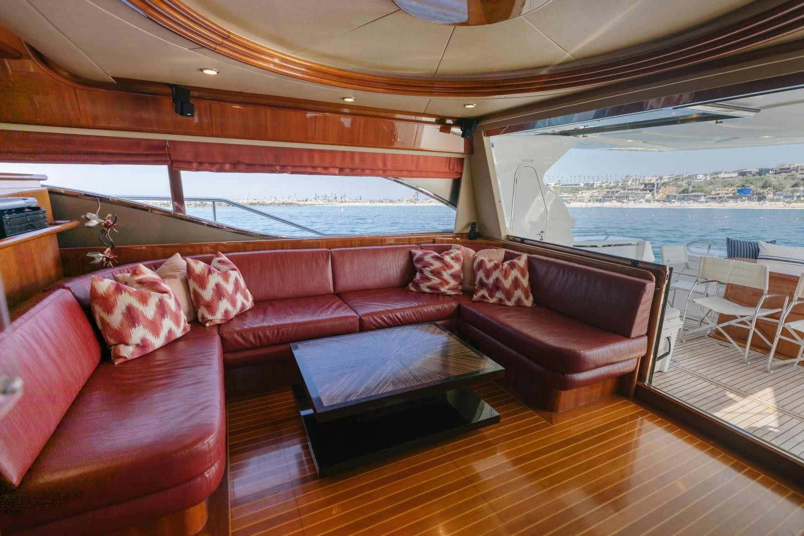 a living room with a large window aboard LIVING LIFE Yacht for Sale